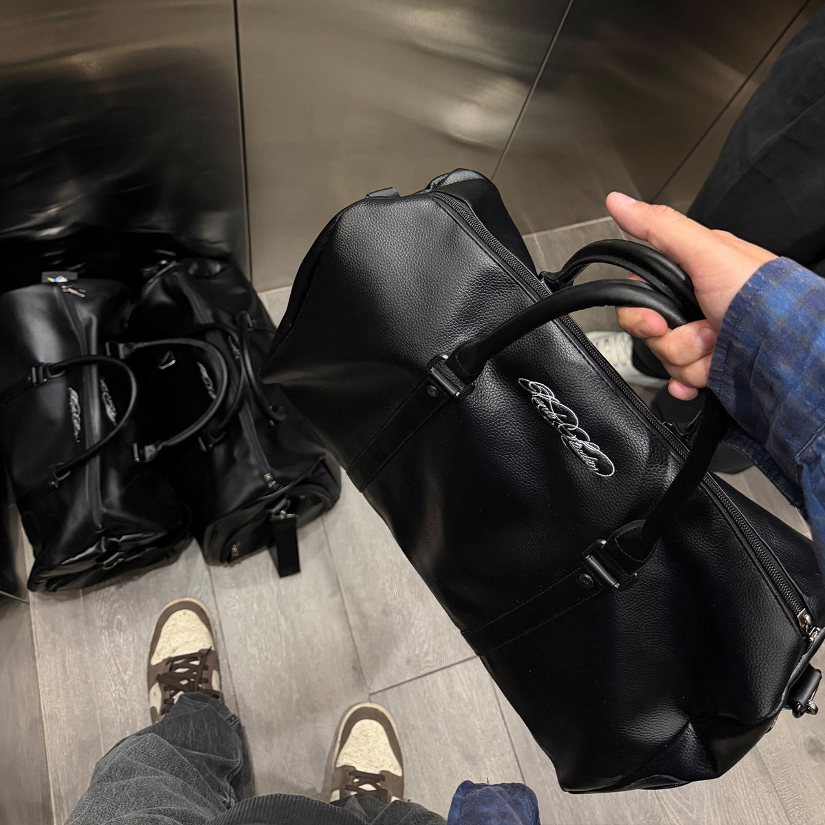 Black Leather Duffle Bag